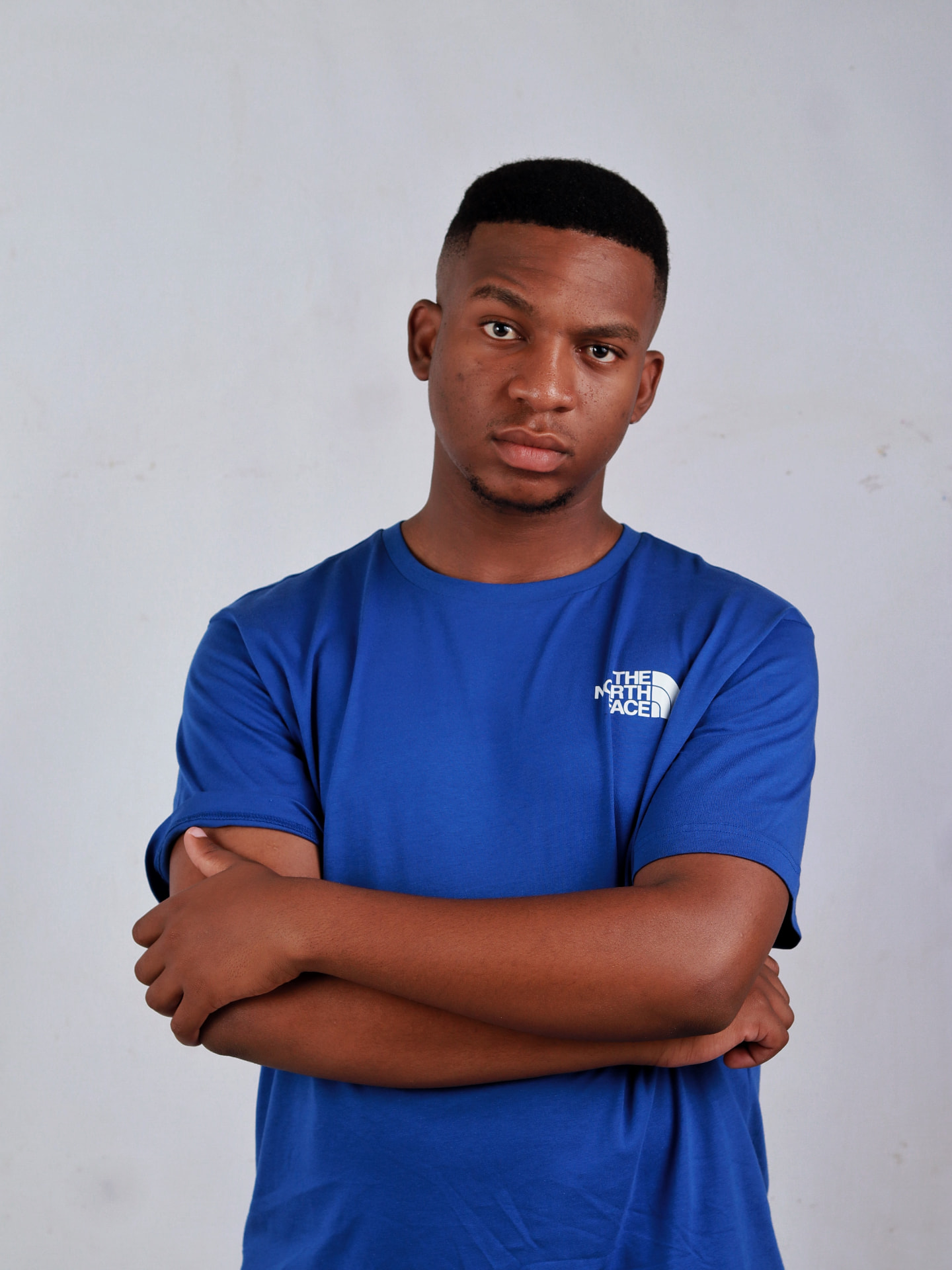 Skhokhie Da DeeJay portrait with arms folded